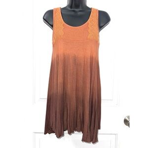 Yak n Yeti Top featuring an ombre dye pattern that fades from orange/rust color